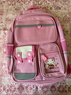 My Melody Bagpack/two pocket on the side for waterbottle and adjustable strap